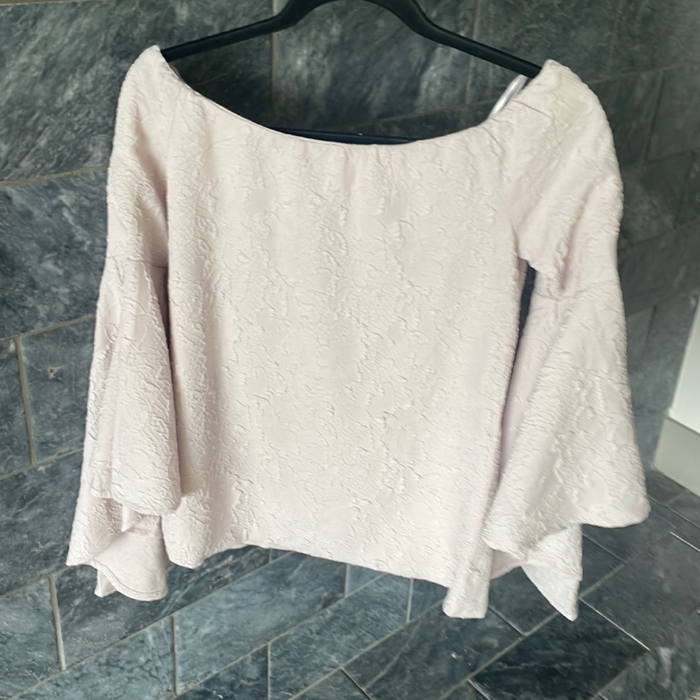 Pale pink long sleeve  blouse.
